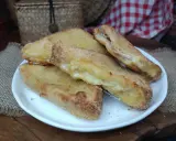 Mozzarella in carrozza dorata e filante, preparata nella friggitrice ad aria.