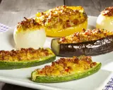 Deliziose verdure ripiene al forno: zucchine, melanzane, peperoni e cipolle dorate, un piatto invitante e saporito.