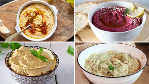 Quattro ciotole di hummus di ceci, uno viola, uno classico, uno con menta e limone, e uno verde.